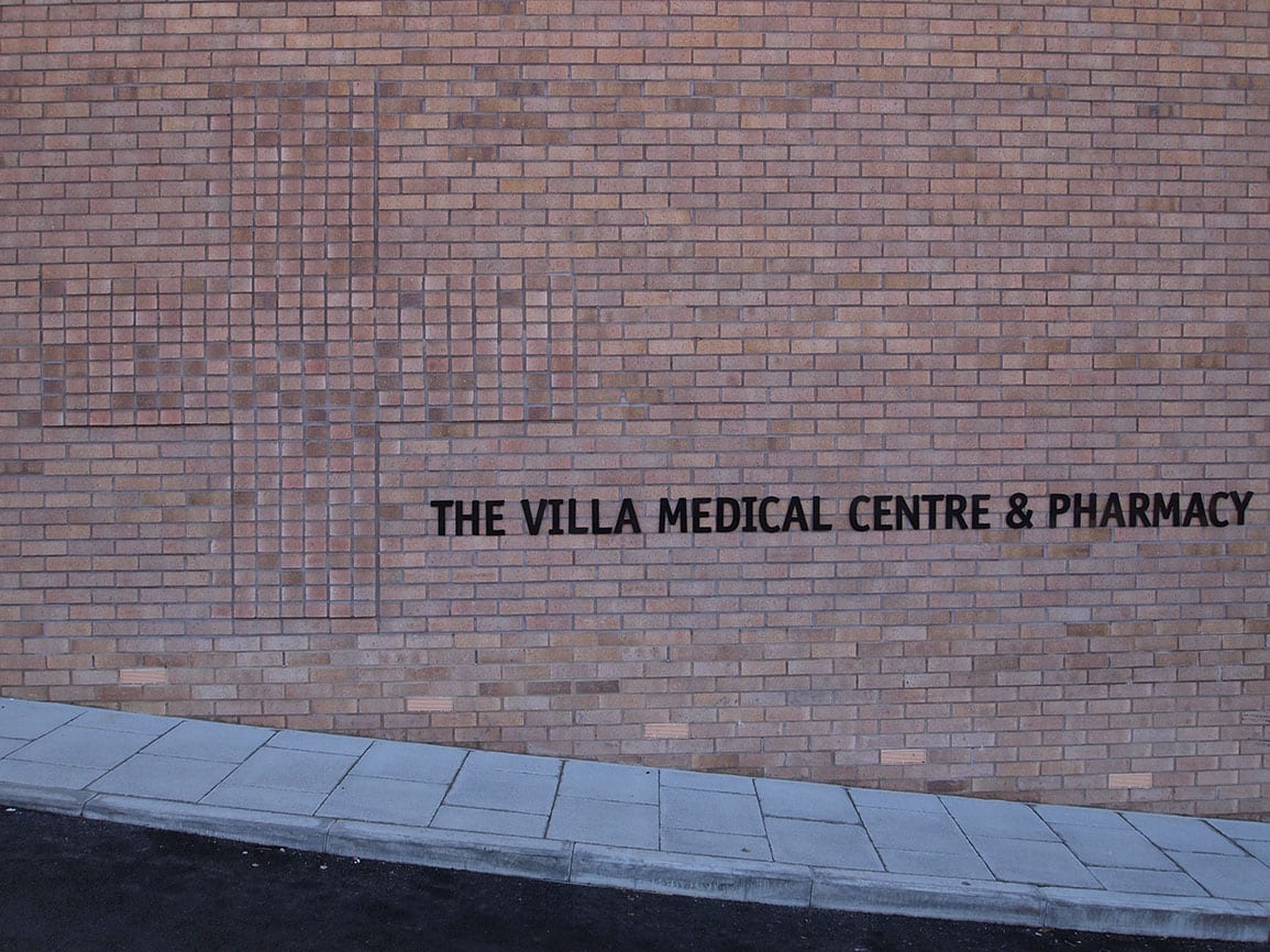 Villa Medical Centre Header Brick Detail and Signage